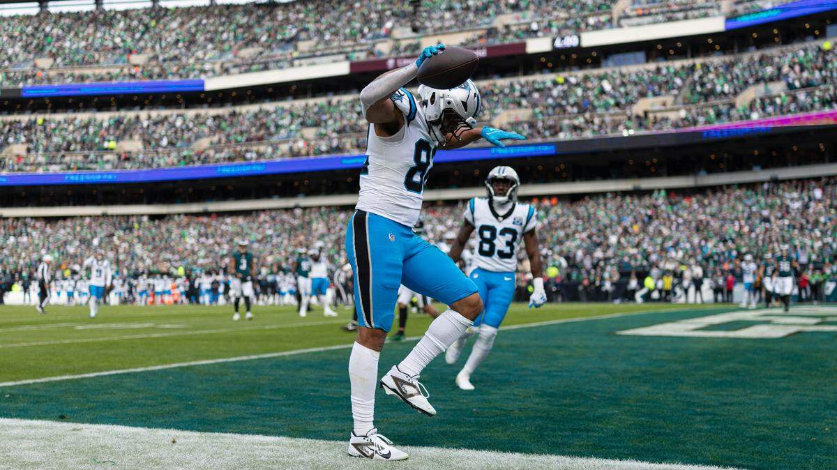 Dec 8, 2024; Philadelphia, Pennsylvania, USA; Carolina Panthers tight end Tommy Tremble (82) reacts after scoring a touchdown against the Philadelphia Eagles during the second quarter at Lincoln Financial Field. Mandatory Credit: Bill Streicher-Imagn Images