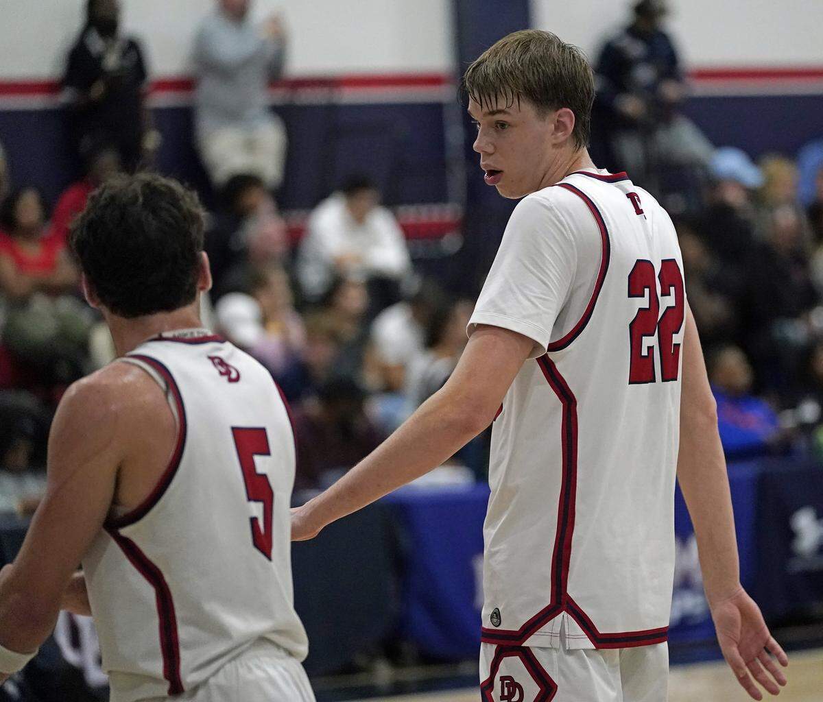 Davidson Day's Will Stevens, right, takes with teammate Nick Arnold during the second half of the Phenom Hoops Classic high school boys basketball game against Christ School on Satuirday, Nov. 15, 2025, in Davidson, N.C. (Photo by Bill Kiser/Special to the Charlotte Observer)