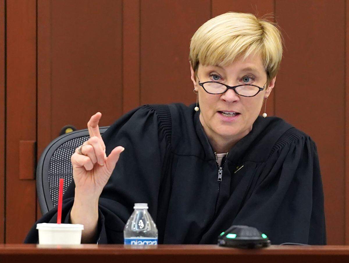 Judge Lisa Bell fought to keep the murder trial in her courtroom from being disrupted Thursday, as others in the Mecklenburg courthouse were sent home over concerns about nausea and headaches that may have been caused by a gas that spread a rotten egg smell in uptown Charlotte.