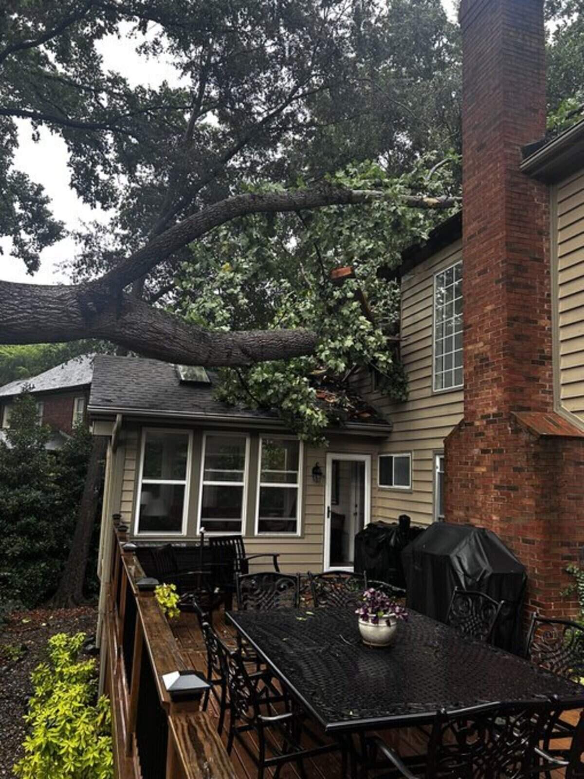 A tree fell on this home in Huntersville’s Wynfield community during intense storms Friday. “Fortunately no injuries, but significant damage to the home,” fire department officials said on social media site X.