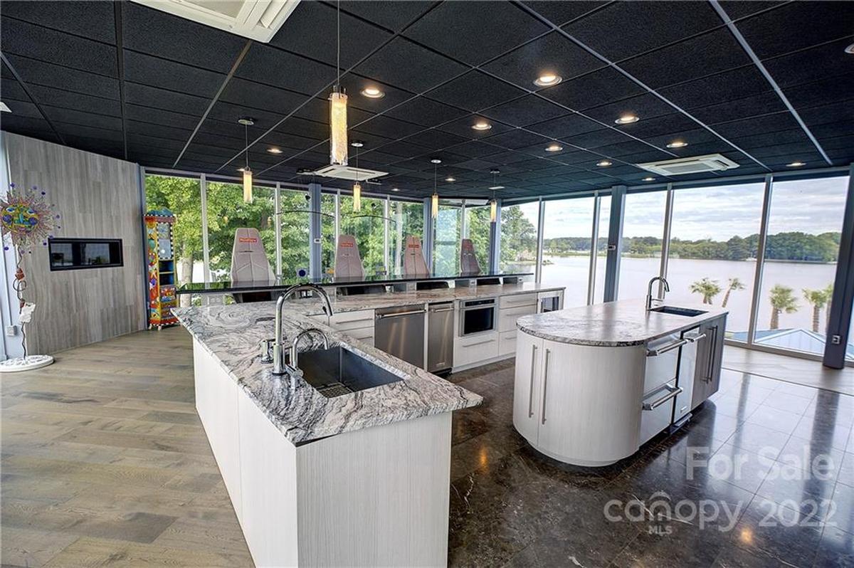 A kitchen is shown in Ted and Beverly Corriher’s Lake Norman glass mansion.