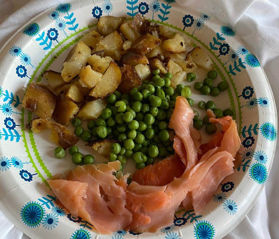 Dinner on paper plates makes things easier when water for washing is scarce.
