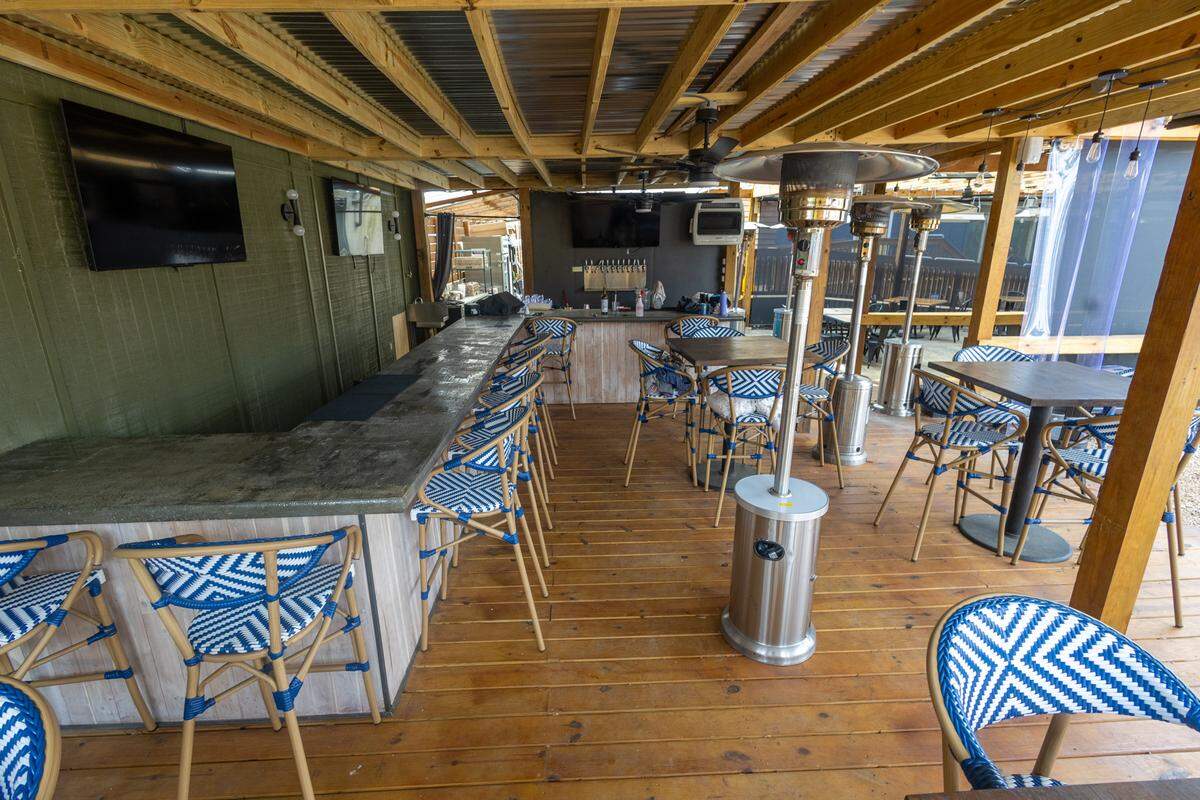 Part of the outdoor bar and patio seating at Kaya Gastrolounge in Belmont.