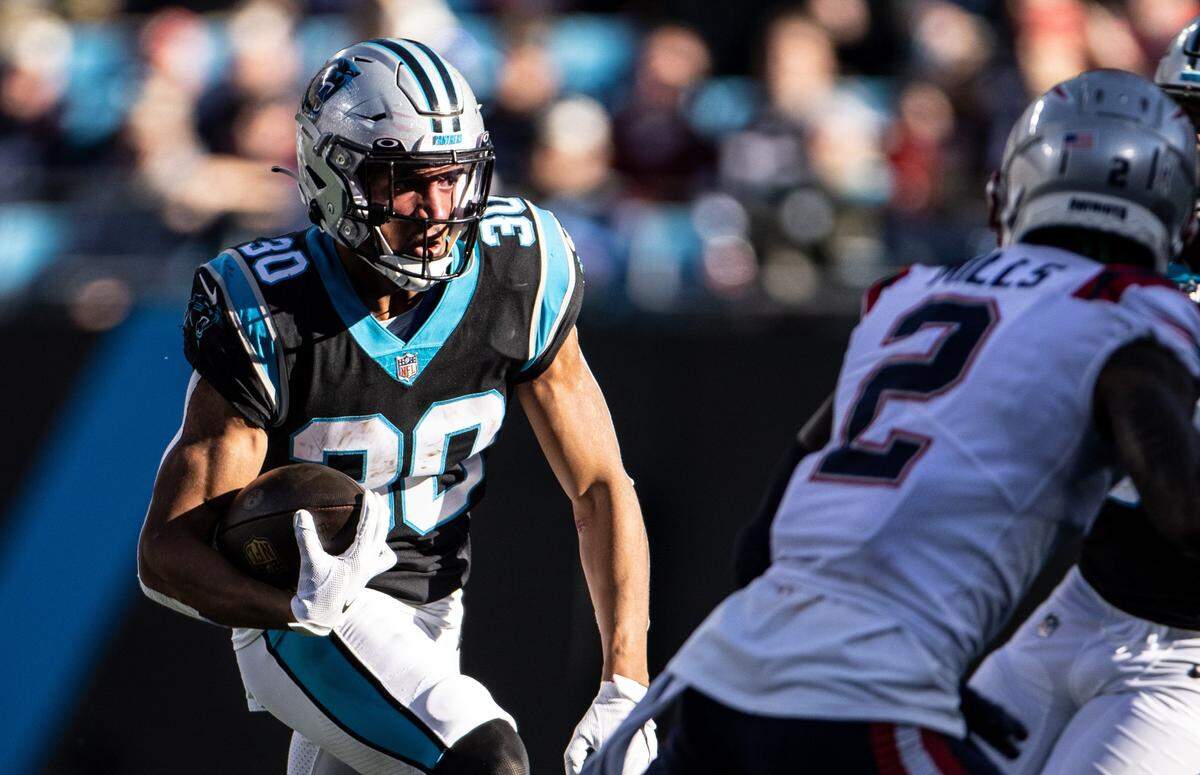 Carolina Panthers Chuba Hubbard runs the ball against the New England Patriots at the Bank of America Stadium in Charlotte, N.C., on Sunday, November 7, 2021.