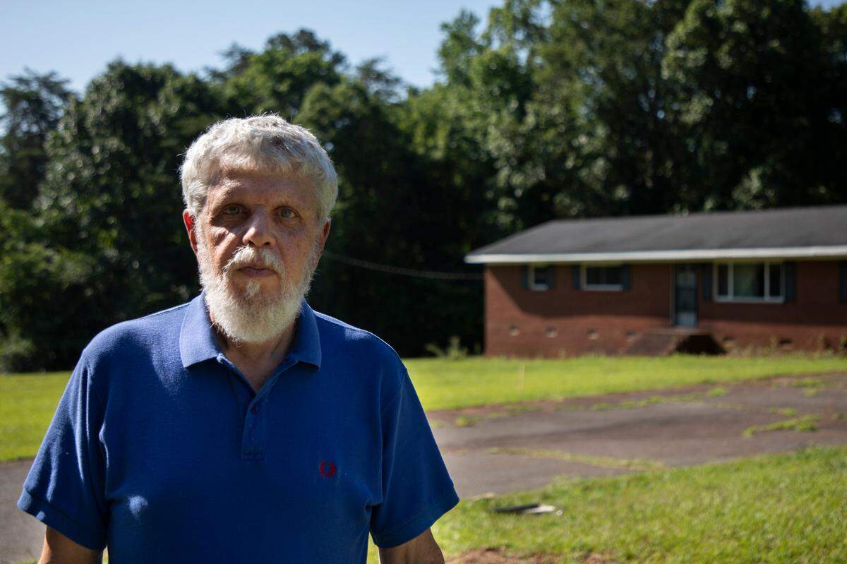 David Hannes has become one of the leading voices not in favor of the new fire department on Woody Point Road in Charlotte, N.C., on June 17 2022.