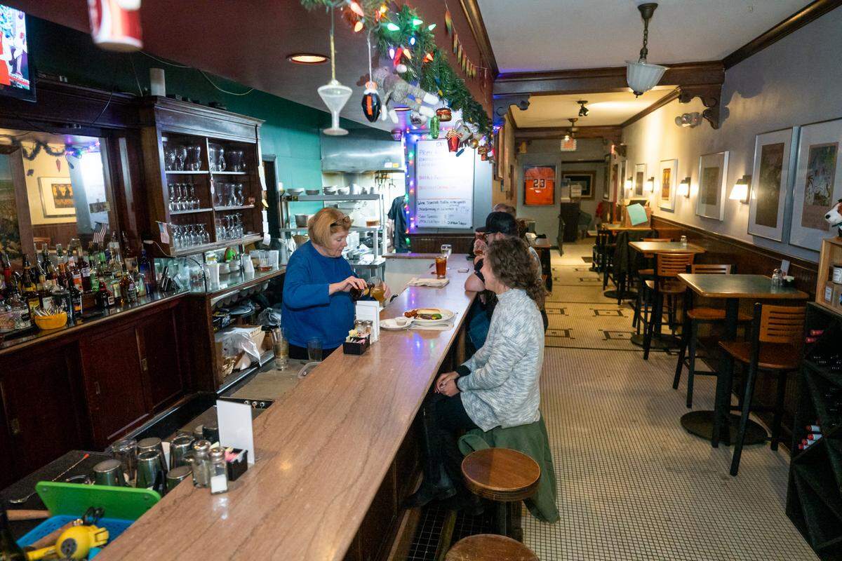 Owner Letty Ketner serves a drink to a guest at Letty’s on Shamrock.