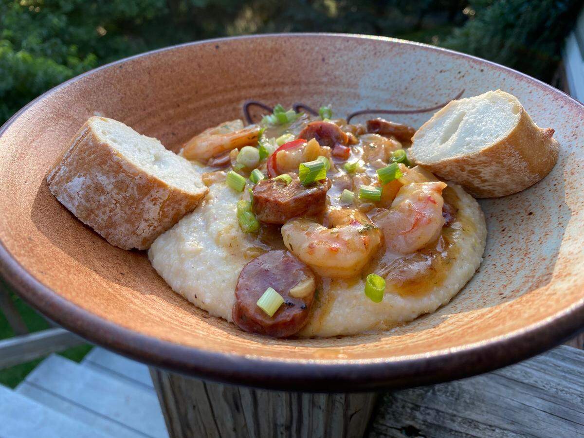 David Sanders posted his meal in the Charlotte group Fatten the Curve: Smoked gouda jalapeno grits covered in shrimp, andouille, vidalia onions, fresno chiles, and garlic. The shrimp mixture was finished in a chicken stock, madeira wine, and fresh squeezed lemon reduction, he wrote.