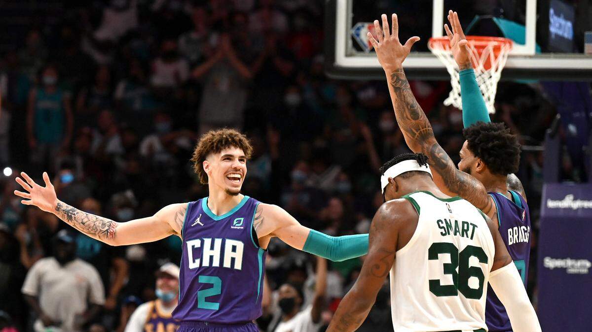 In his second year, Charlotte Hornets guard LaMelo Ball (2) and forward Miles Bridges (right, with hands up) have formed one of the NBA’s top tandems.