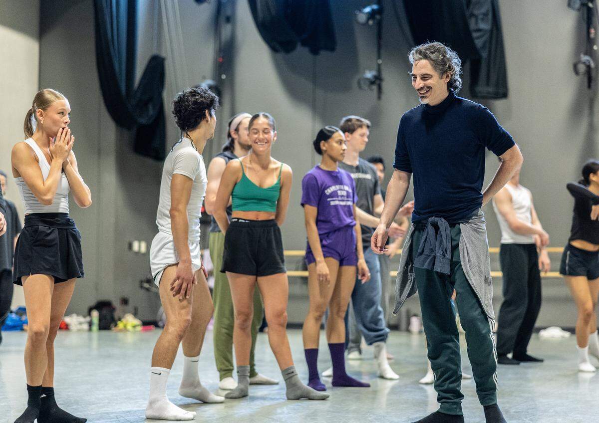 Charlotte Ballet artistic director Alejandro Cerrudo, at right, with dancers rehearsing his "One Thousand Pieces." 