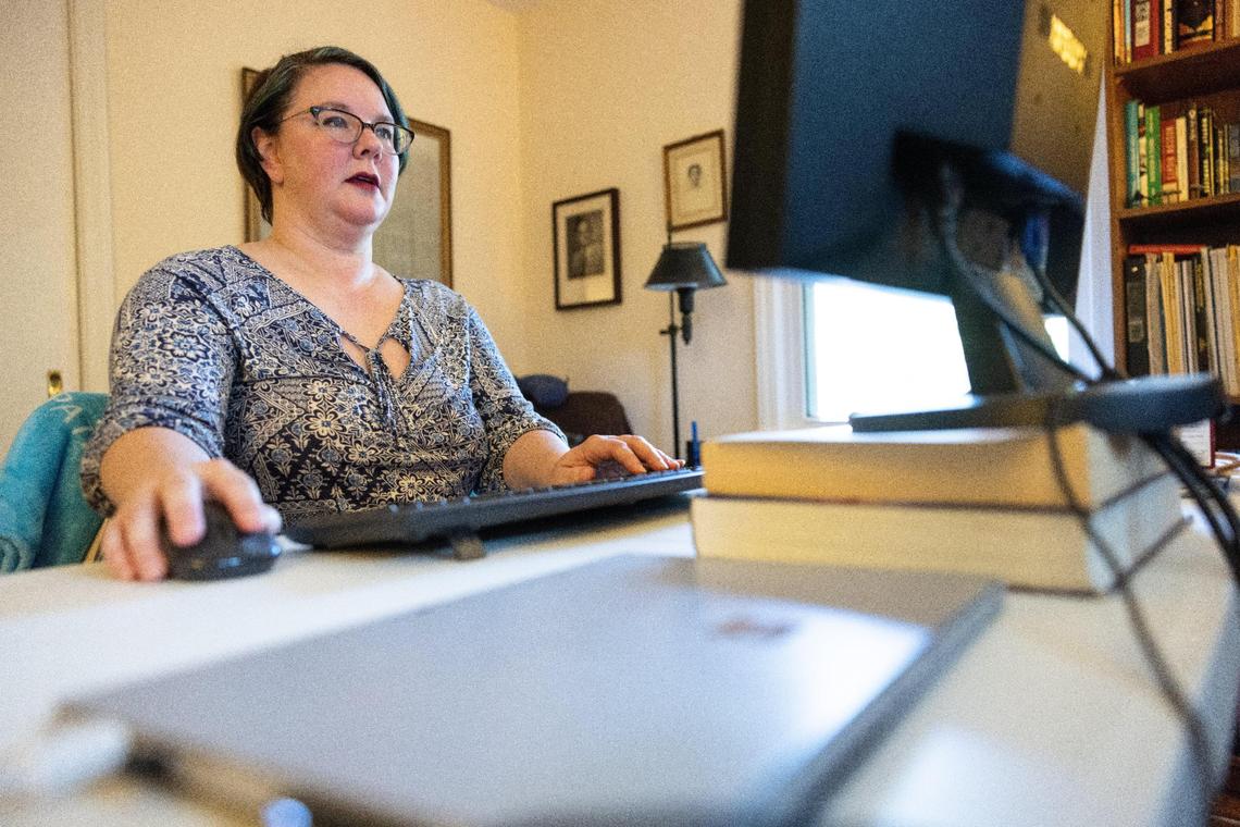 Caroline Cave owes more than $60,000 in federal loans from a post-graduate certificate program at UNC Charlotte. Now she works from home in Charlotte, N.C., on Wednesday, July 6, 2022.