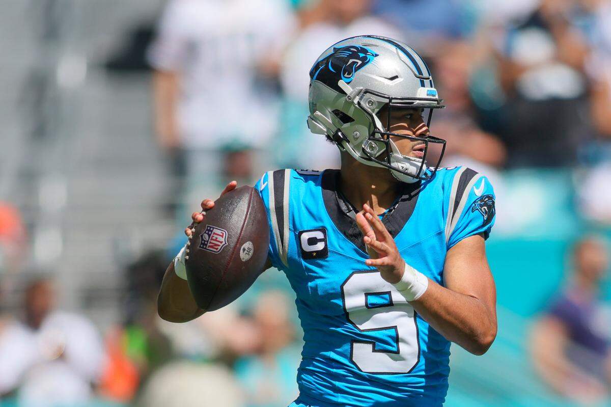 Carolina Panthers quarterback Bryce Young looks for a passing option against the Miami Dolphins during Sunday’s first quarter at Hard Rock Stadium.