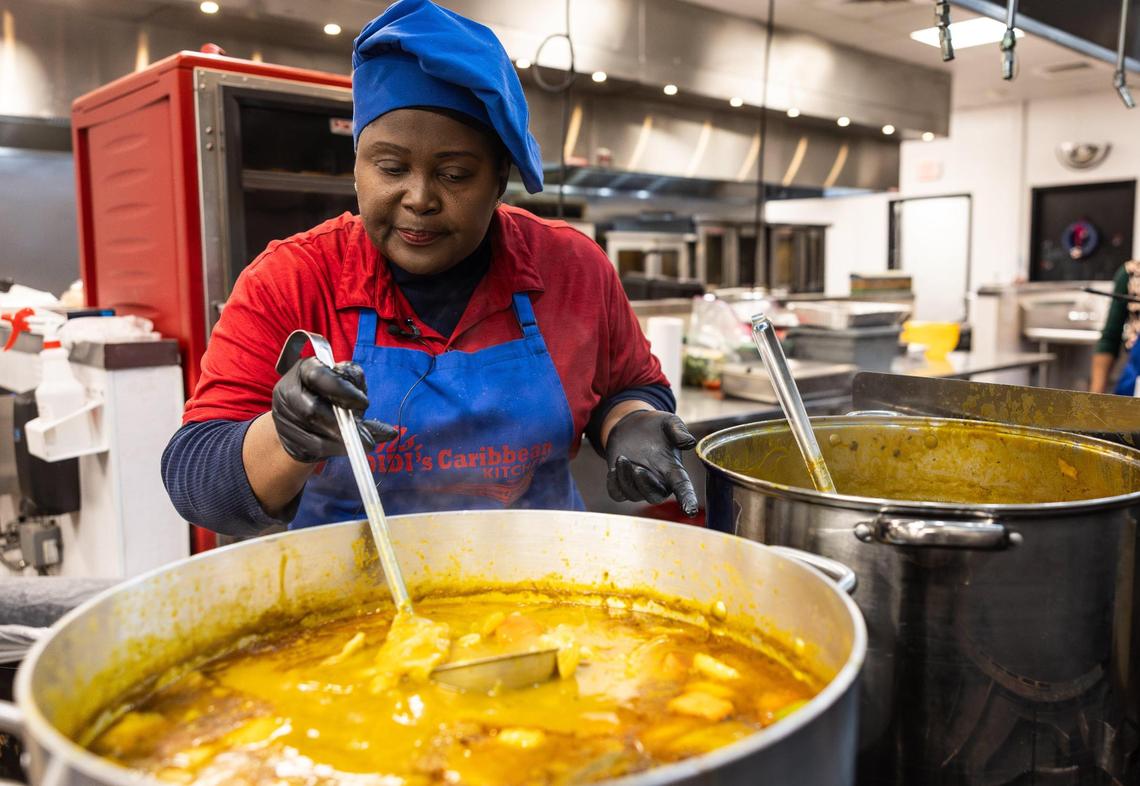 Edith Jean-Francois, owner of Ms. Didi’s Caribbean Kitchen, stirs a pot of soup joumou on New Years Eve. Soup joumou represents freedom in Haitian culture and is eaten on Haitian Independence Day on Jan. 1. Tuesday, December 31, 2024.