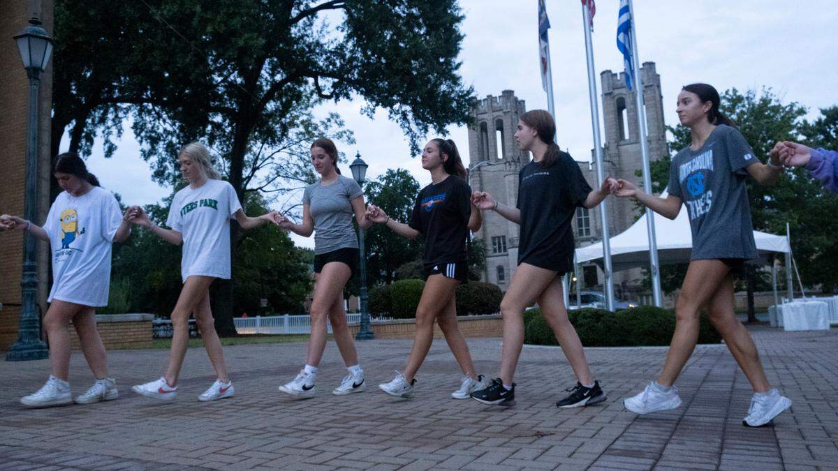 High schoolers at Holy Trinity Greek Orthodox Cathedral practice for contemporary dances at the Yiasou Greek Festival in 2022.
