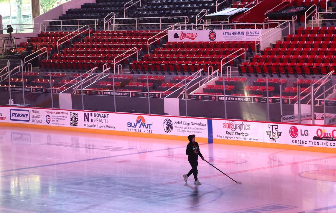 Charlotte Checkers team attendant Luke Kahn walks across the ice prior to the team’s game against the Cleveland Monsters at Bojangles Coliseum in Charlotte, NC on Friday, October 18, 2024.
