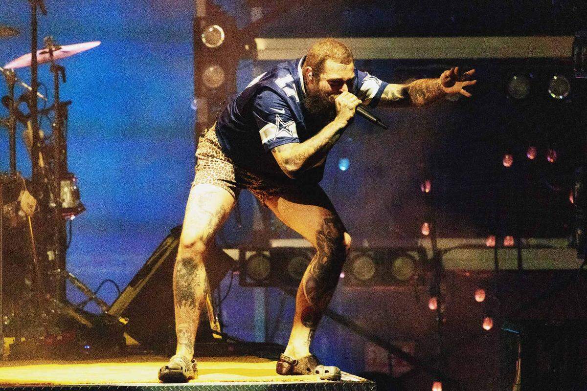 Post Malone performs at PNC Music Pavilion on Monday night.
