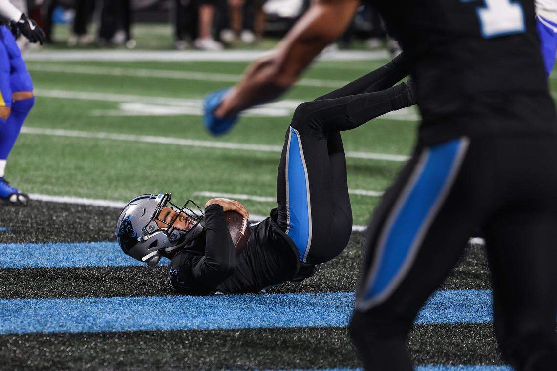 Panthers quarterback Bryce Young falls into the end zone for a touchdown during the the Wild Card playoff game against the Rams at Bank of America Stadium  in Charlotte on Saturday, January 10, 2026.