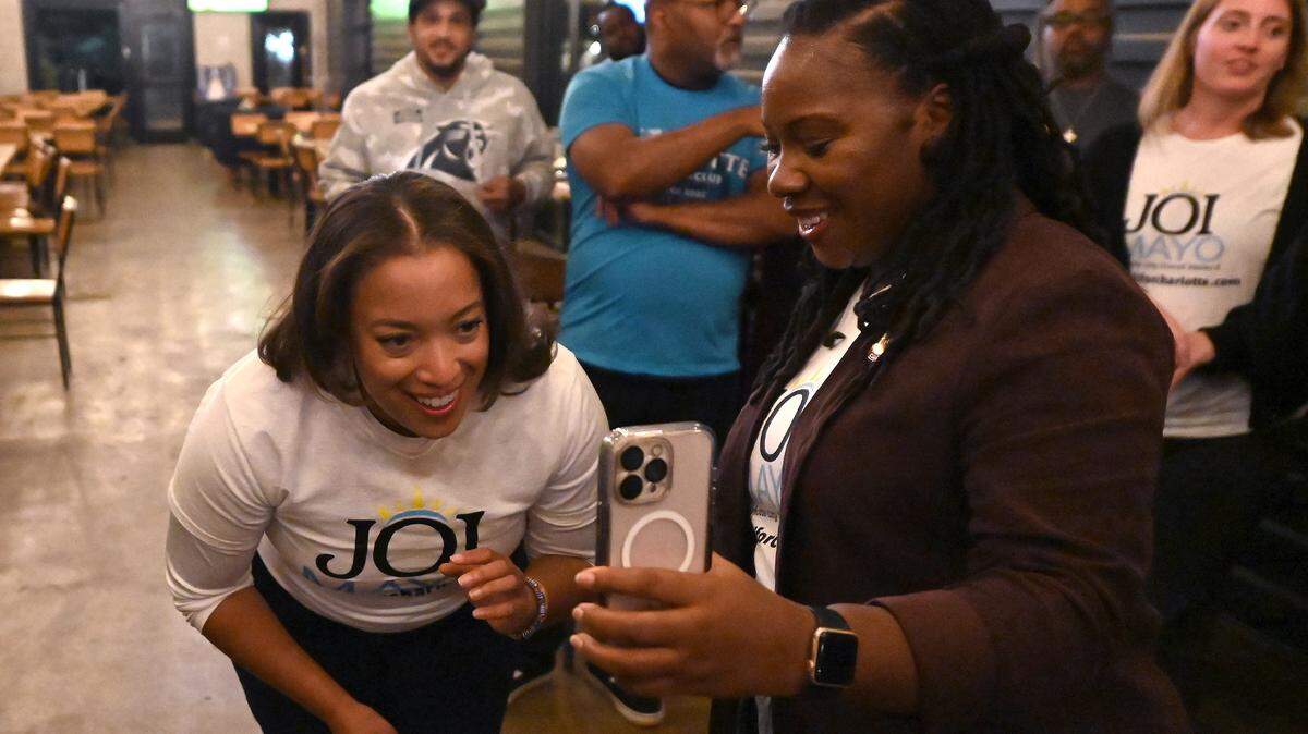 District 3 Charlotte City Council Representative candidate Joi Mayo, left, talks with her mother following her victory over incumbent Tiawana Brown on Tuesday, September 9, 2025 at Brewers at Yancey in Charlotte. Mayo defeated  Tiawana Brown for the District 3 seat.