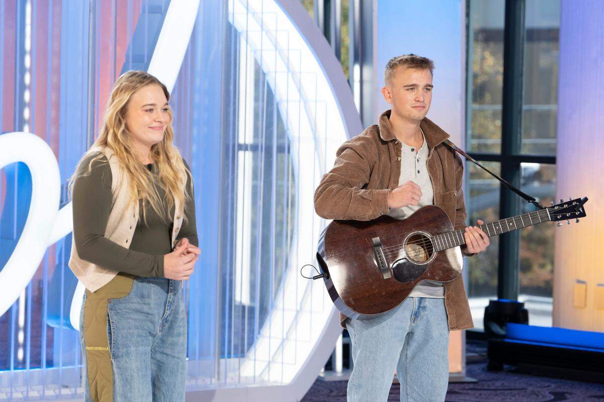 Laela Dasher stands beside her brother, Max, after singing in front of the judges.