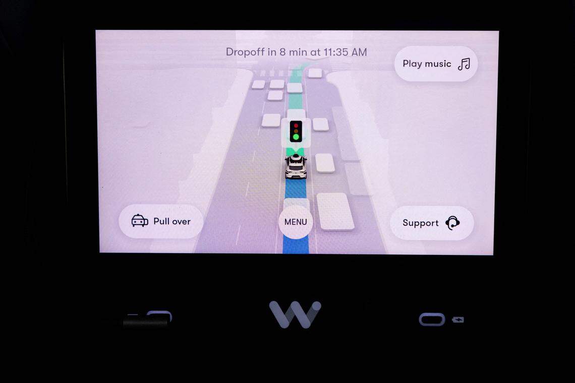 A screen inside a Waymo autonomous vehicle in San Francisco, on November 17, 2023. (Photo by Jason Henry / AFP) (Photo by JASON HENRY/AFP via Getty Images)