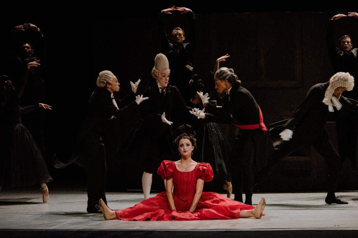 Chelsea Dumas, the lady in red, is Rosetta in Charlotte Ballet’s “Leonce and Lena.” Charlotte Ballet is one of the local organizations that offers challenging or unfamiliar work, retiring Observer critic Lawrence Toppman says.