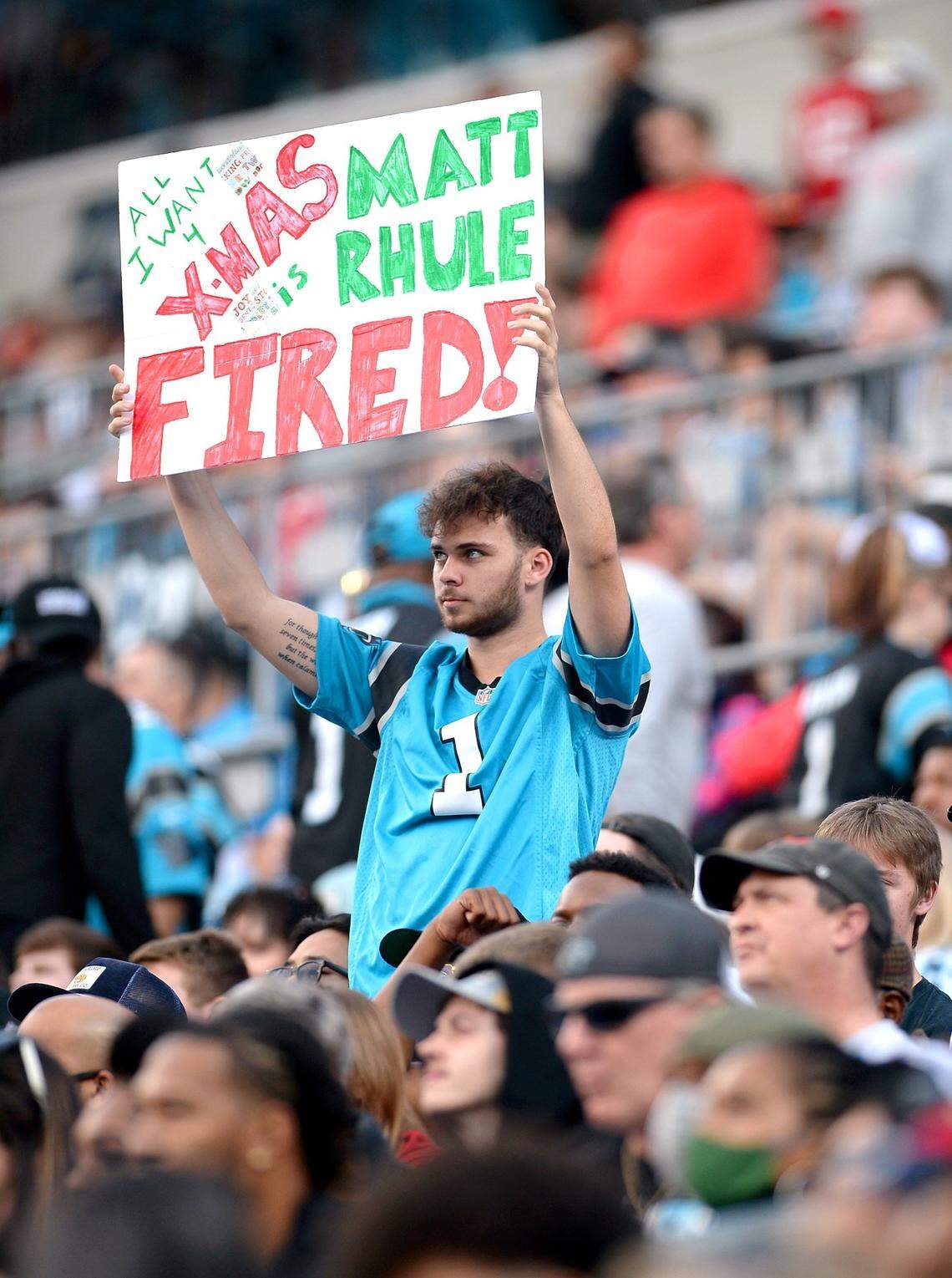 A Carolina Panthers fan reveals his Christmas wish during the team’s game against the Tampa Bay Buccaneers on Sunday, December 26, 2021 at Bank of America Stadium in Charlotte, NC. The Buccaneers defeated the Panthers 32-6.