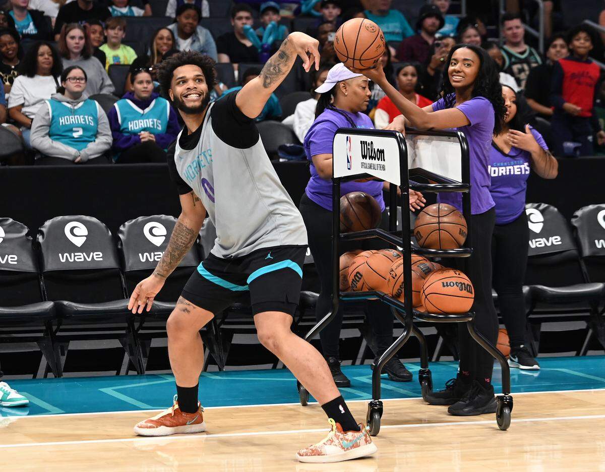 Charlotte Hornets forward Miles Bridges admires his final three-point attempt during a competition at the team’s Purple and Teal scrimmage at Spectrum Center in Charlotte, NC on Saturday, October 7, 2023.