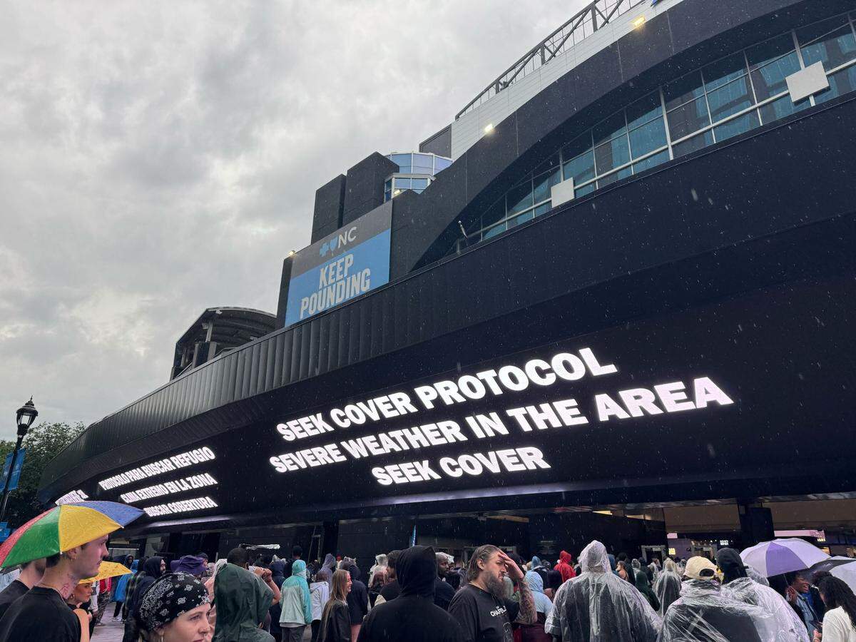 Message boards at Bank of America stadium advise Kendrick Lamar and SZA fans to seek shelter as the gates opened.