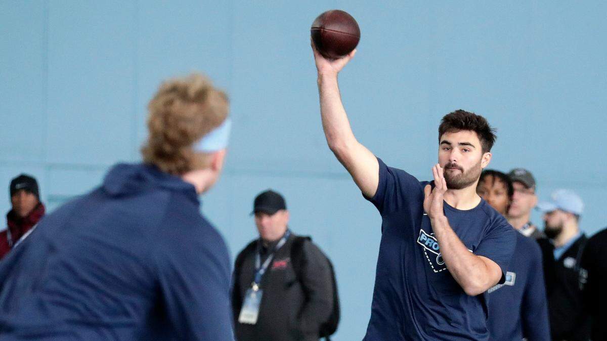 North Carolina quarterback Sam Howell demonstates his skills for NFL scouts during Pro Day, Monday, March 28, 2022, in Chapel Hill, N.C. (AP Photo/Chris Seward)