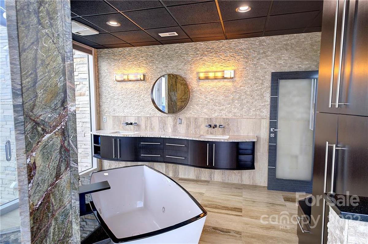 The primary bathroom of the mansion is shown.