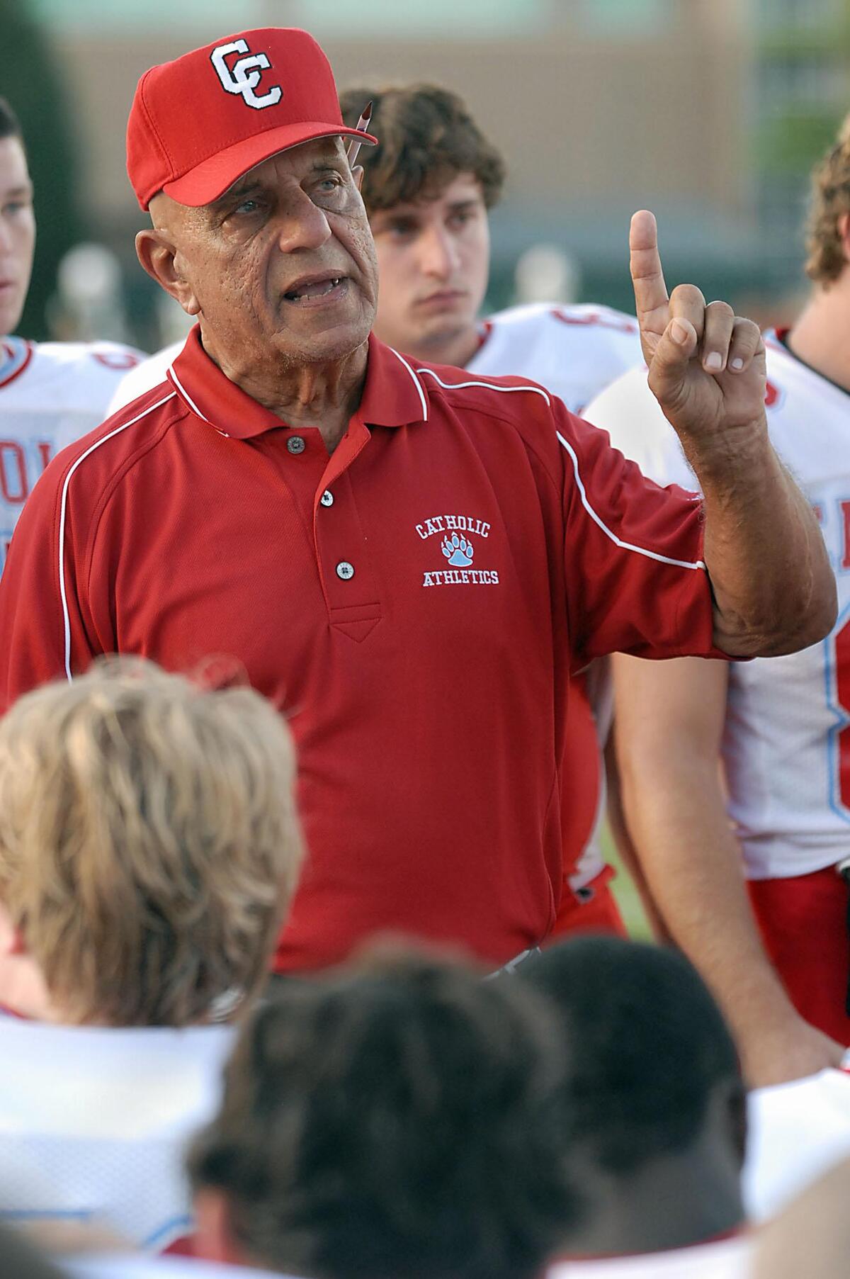 09-04-09 Charlotte, NC. Charlotte Catholic Cougars coach Jim Oddo, looking for his 301st win, talks to his team before the game. This picture was taken during the Charlotte Catholic at Charlotte Country Day high school football game in Charlotte, NC. Marty Price/Special to The Observer