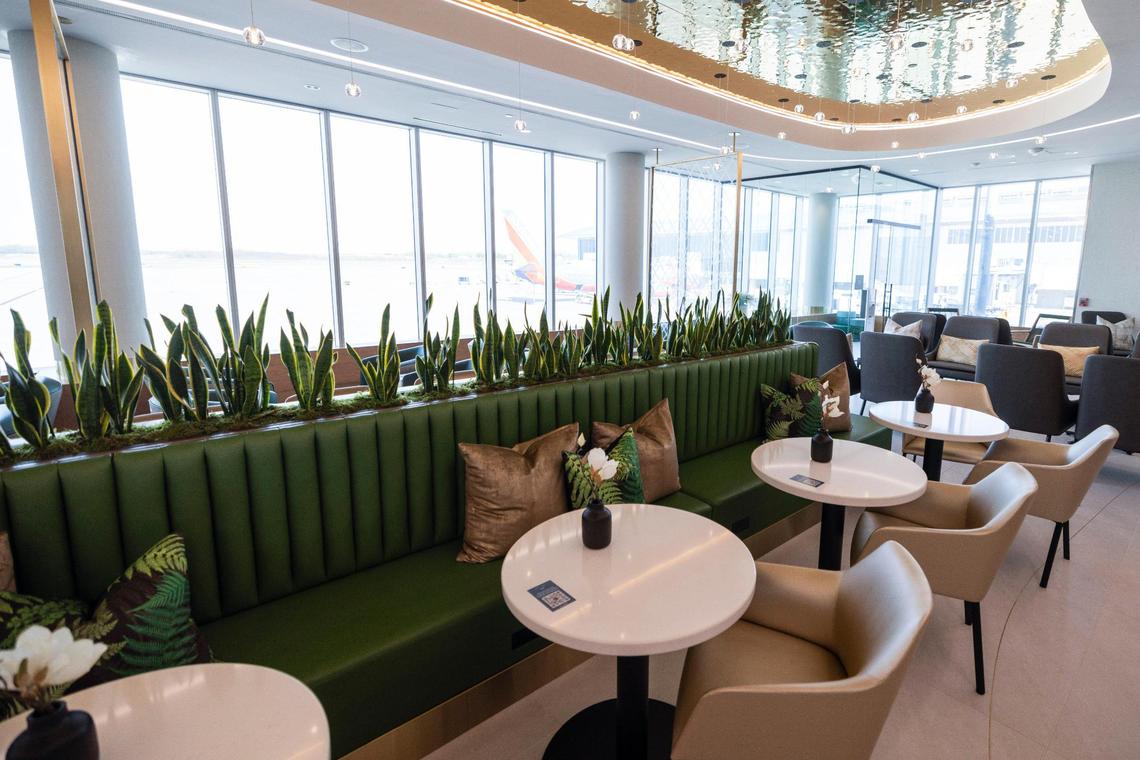 Customers at new airport lounge The Club CLT can order food directly to their tables.