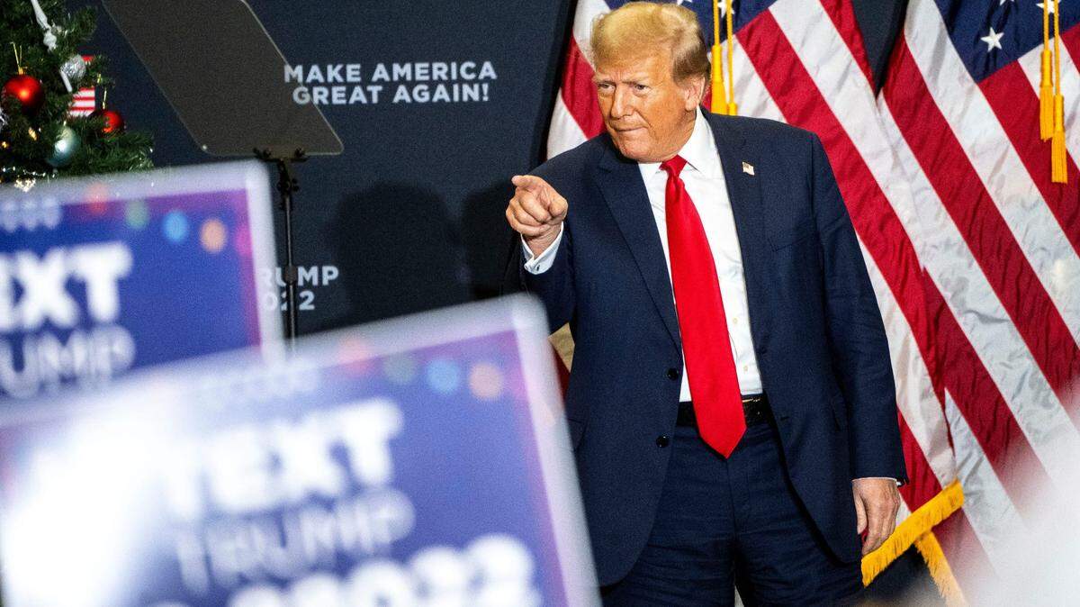 Former President Donald Trump points into the crowd during a campaign rally at Waterloo Convention Center on Tuesday, Dec. 19, 2023, in Waterloo.