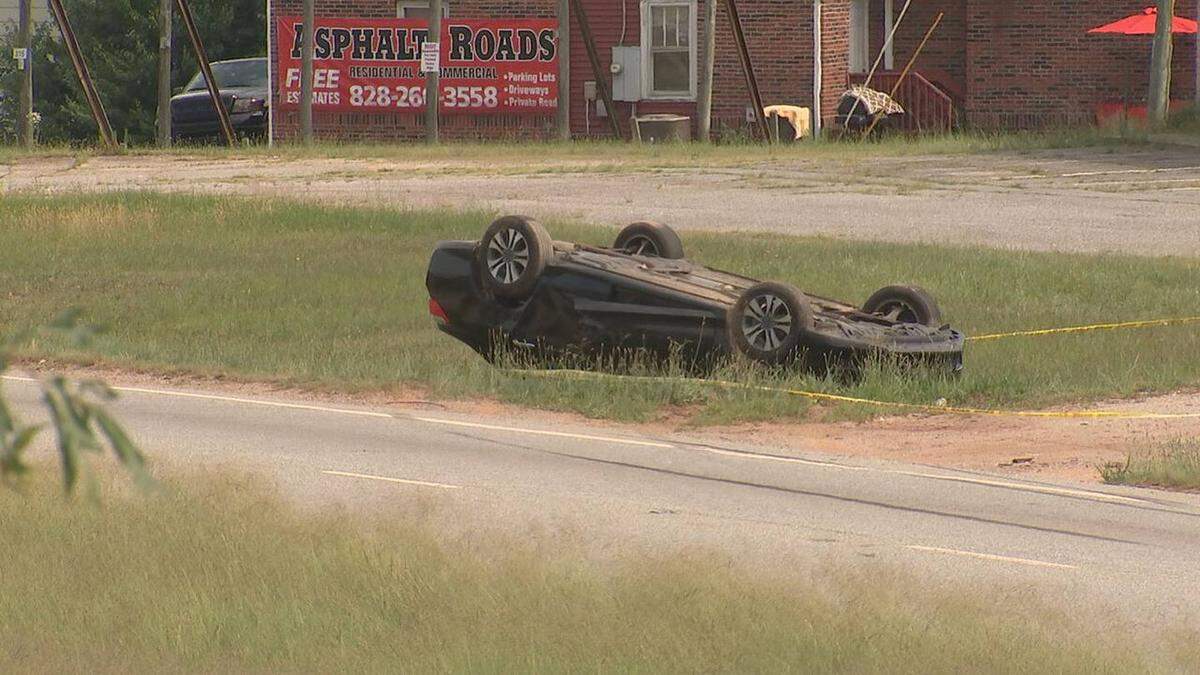 Authorities say a Caldwell County sheriff’s deputy and a North Carolina State Highway Patrol trooper found themselves in a shootout the driver of this overturned Honda on Sunday, June 12, 2022.