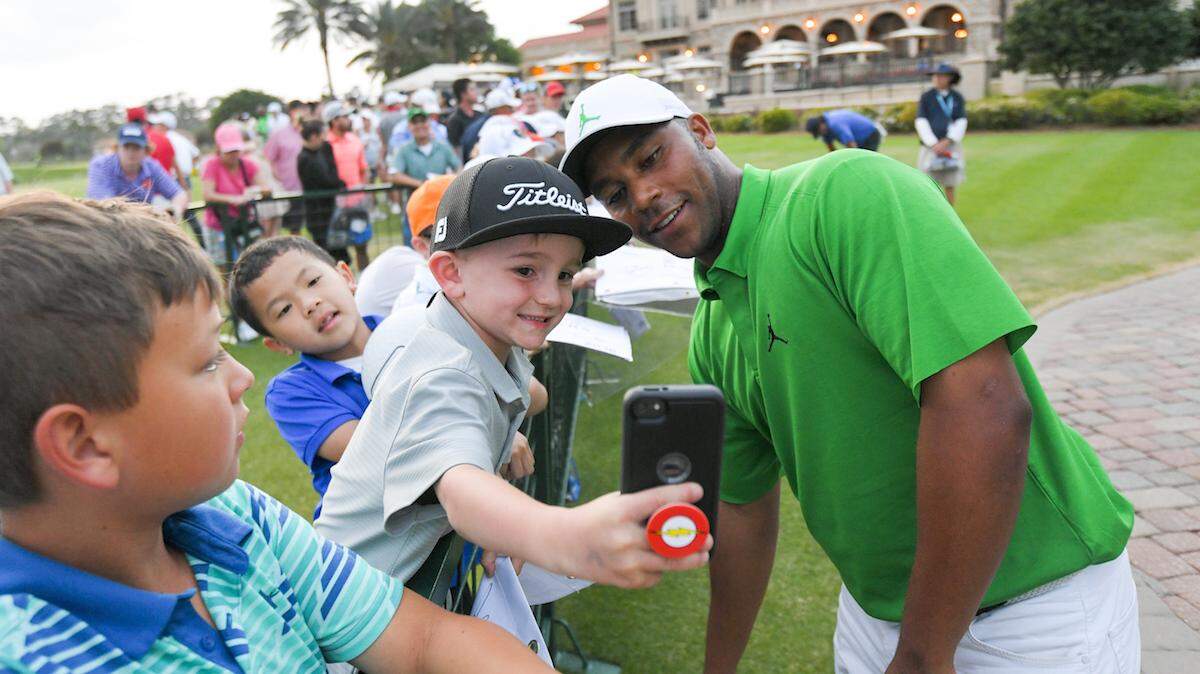 PONTE VEDRA BEACH, FL - MARCH 15: Harold Varner III with fans after his second round of THE PLAYERS Championship on THE PLAYERS Stadium Course at TPC Sawgrass on March 15, 2019, in Ponte Vedra Beach . (Photo by Chris Condon/PGA TOUR)