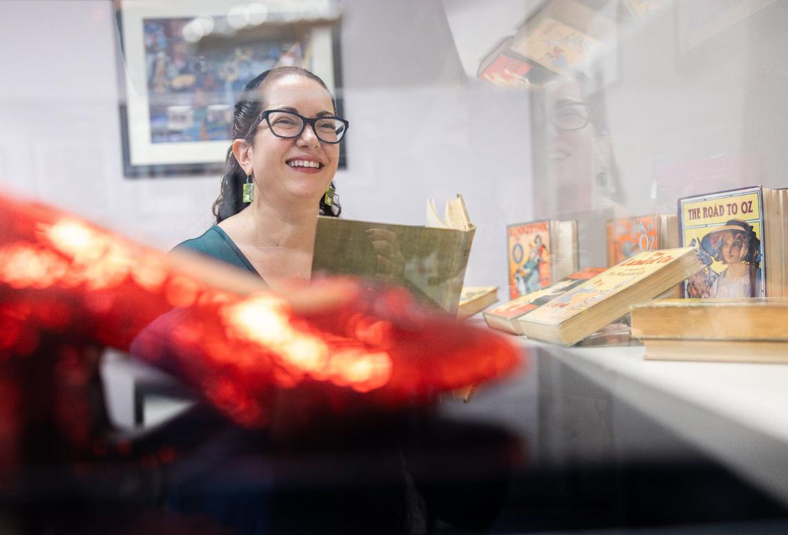 Dina Massachi is organizing a Wizard of Oz festival called CharlOz in Charlotte Sept. 27-29. She is a lecturer in UNC Charlotte’s English Department and American Studies Program, and is seen here with some of her Oz memorabilia at her office.