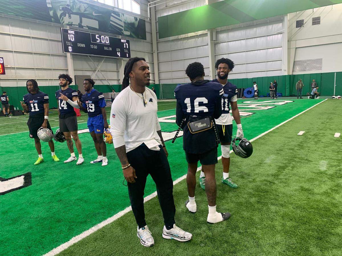 Carolina Panthers assistant special teams coach Daren Bates watches practice as he serves as East team special teams coordinator for the 2025 East-West Shrine Game. The practices took place in Denton, Texas on the campus of the University of North Texas.