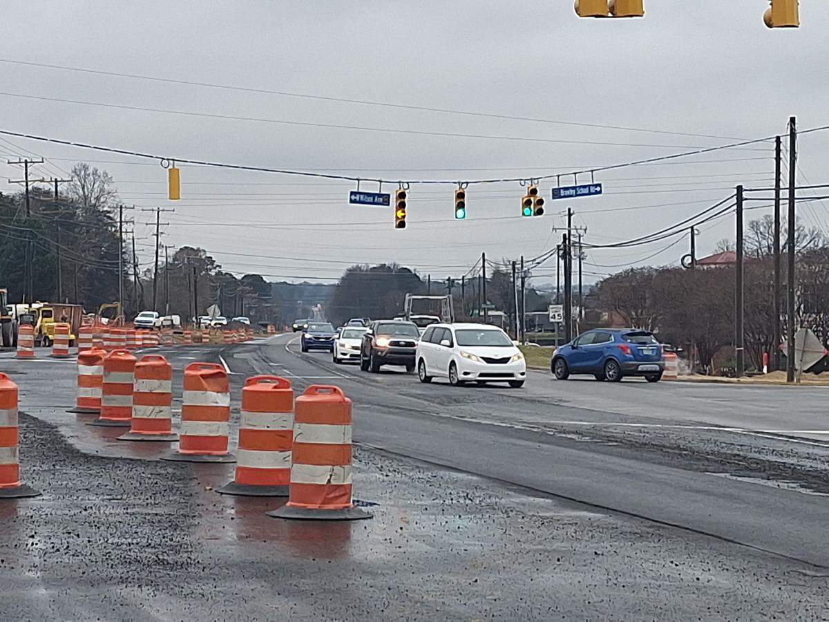Drivers on U.S. 21 North in Mooresville wait to turn left onto Brawley School Road on Monday at the new intersection at West Wilson Avenue, Brawley School Road and U.S. 21.