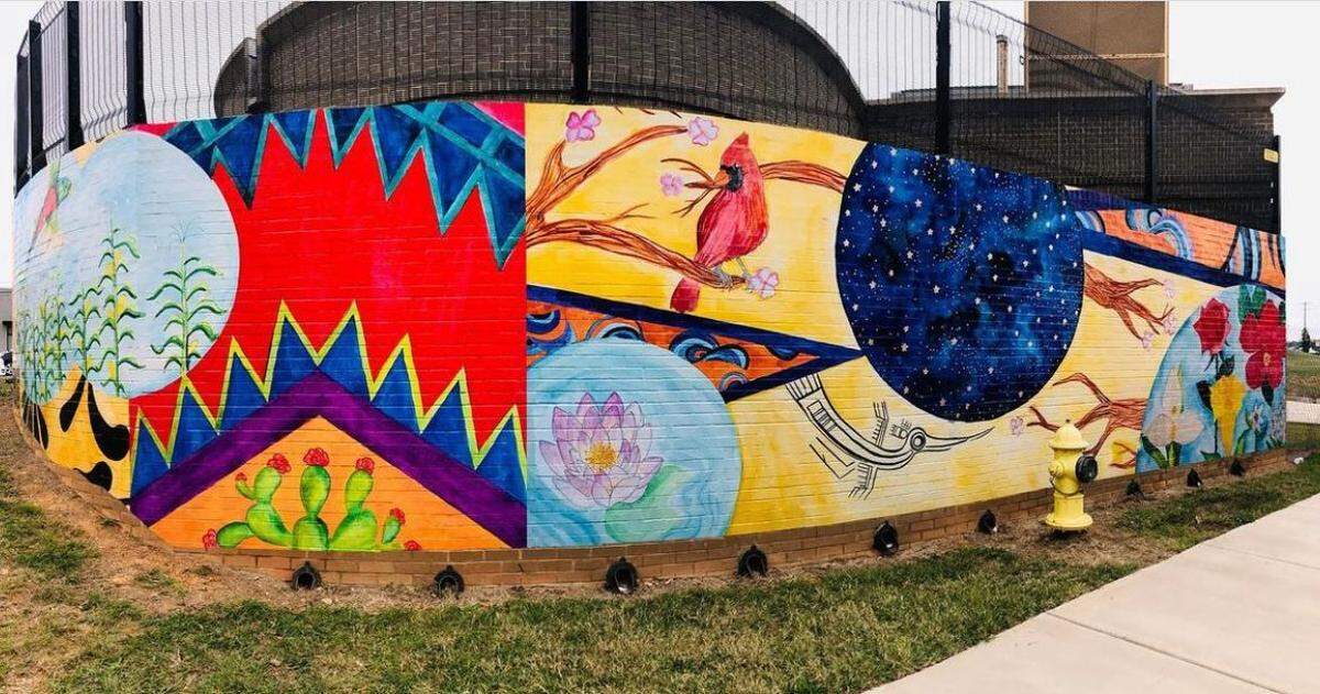 “Tapestry” was a wrapped mural at the intersection of Monroe and Idlewild roads, created by several members of the OBRA Collective aimed at celebrating the diversity of immigrant cultures found in east Charlotte. The mural suffered water damaged and is no longer intact.