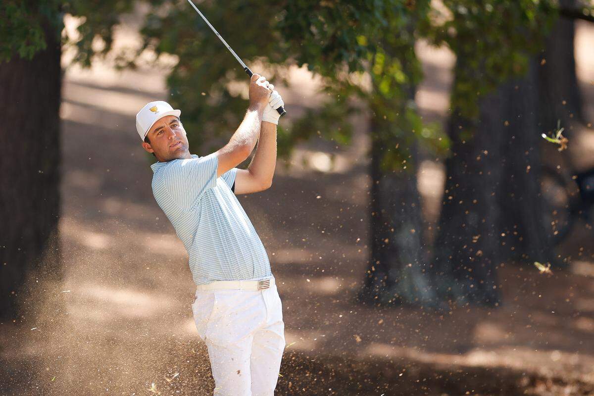 Scottie Scheffler eyes the ball during the Presidents Cup at Quail Hollow Club on Thursday, Sept. 22, 2022 in Charlotte, NC.