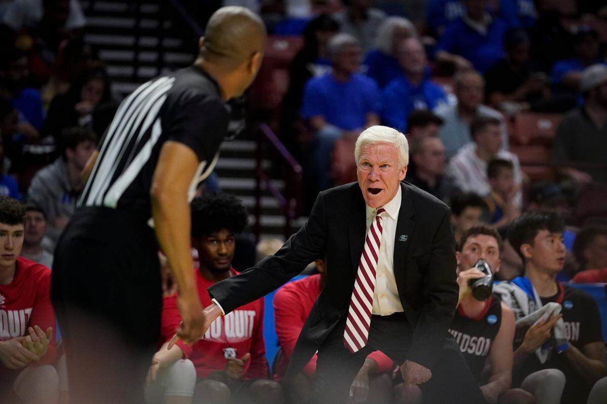Davidson head coach Bob McKillop yells at an official during the first half of a college basketball game against Michigan State in the first round of the NCAA tournament on Friday, March 18, 2022, in Greenville, S.C.