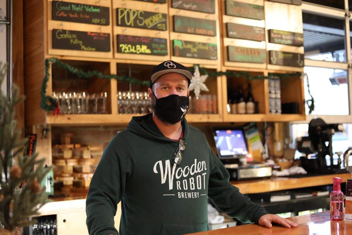 Will Dawson, a supervisor and bartender at Wooden Robot, asks customers to simply follow the rules during COVID-19.