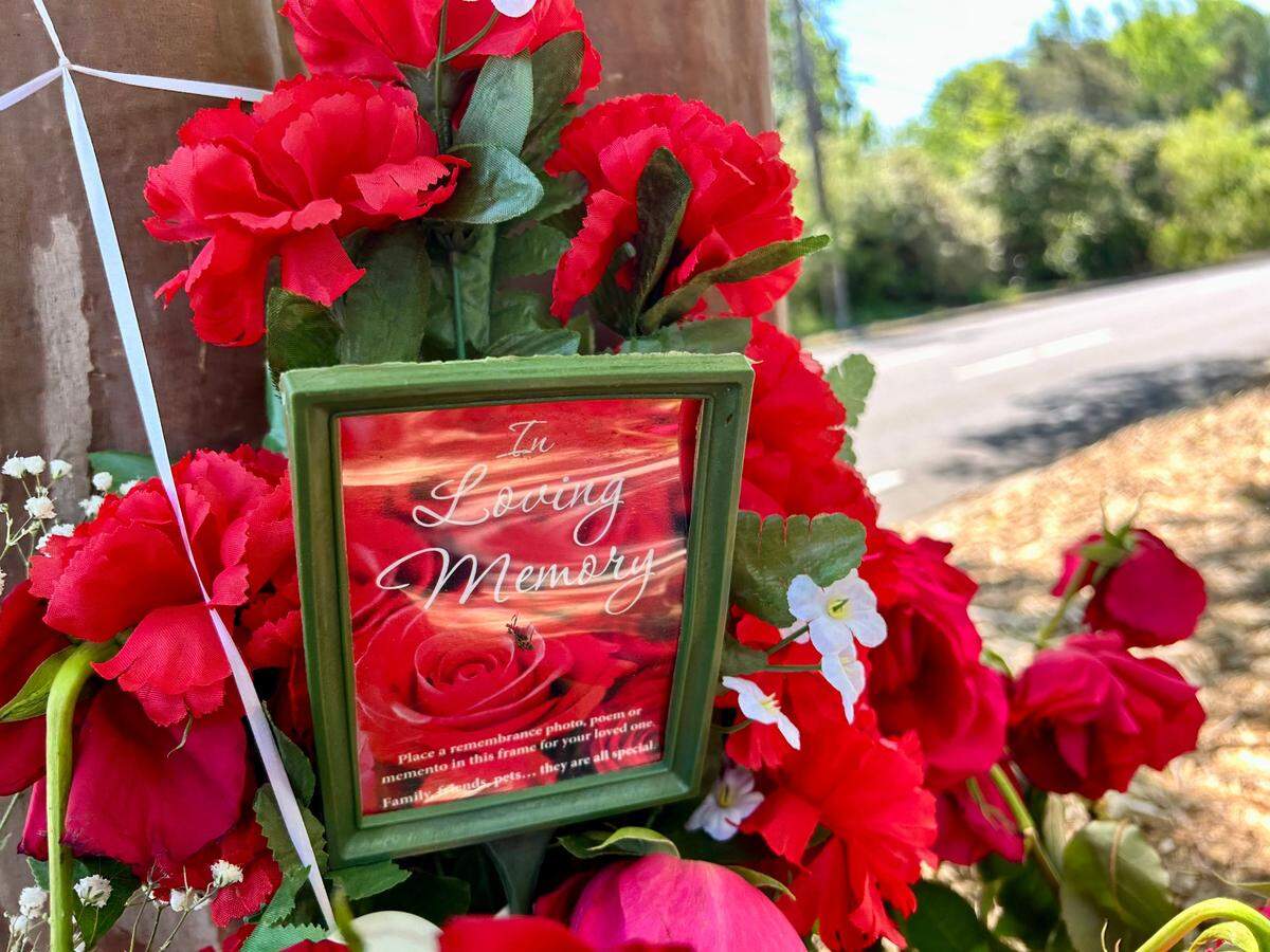 On April 10, the Santos family placed roses and carnations in the median of Park Road, near South Mecklenburg High, in honor of Rosalina Santos, a 49-year-old grandmother who was killed in a car crash on Park Road on April 4 while on the way to buy milk at Walmart for her grandson.
