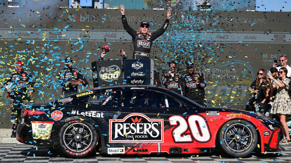 Mar 9, 2025; Avondale, Arizona, USA; NASCAR Cup Series driver Christopher Bell (20) celebrates his victory of the Shriners Children’s 500 at Phoenix Raceway.