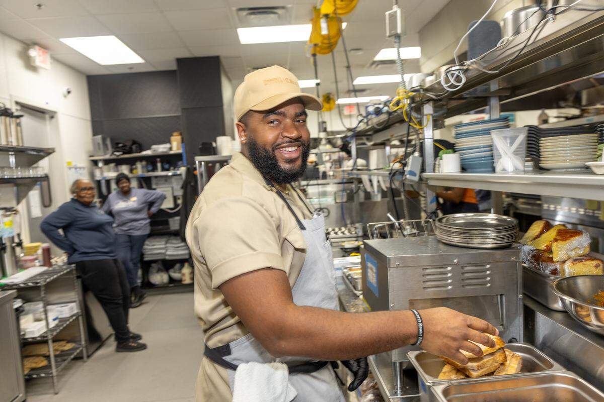Chef Chayil Johnson, shown in the kitchen at Community Matters Cafe, worked at Mediterranean restaurant Shaya in New Orleans and The Asbury in Charlotte before joining Community Matters when it opened in 2019.