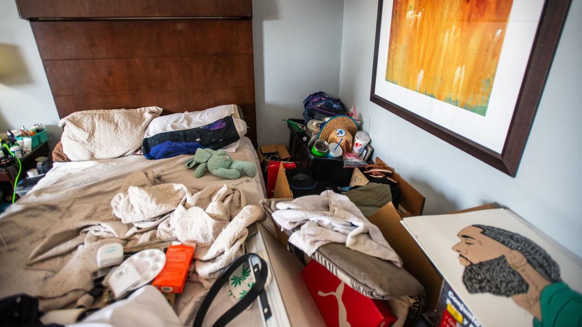 Ellen Miller and Eveco Haggins’s belongings stack along the walls at the Lamplighter Inn where they live in on June 6, 2024.