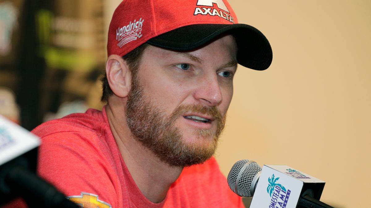 In this photo from Nov. 17, 2017, Dale Earnhardt Jr. speaks with the media during a news conference before a NASCAR Cup series race at Homestead-Miami Speedway. Earnhardt and other NASCAR stars have been tweeting their 2019 “dream tracks” this week, venues that currently host no races in the sport.