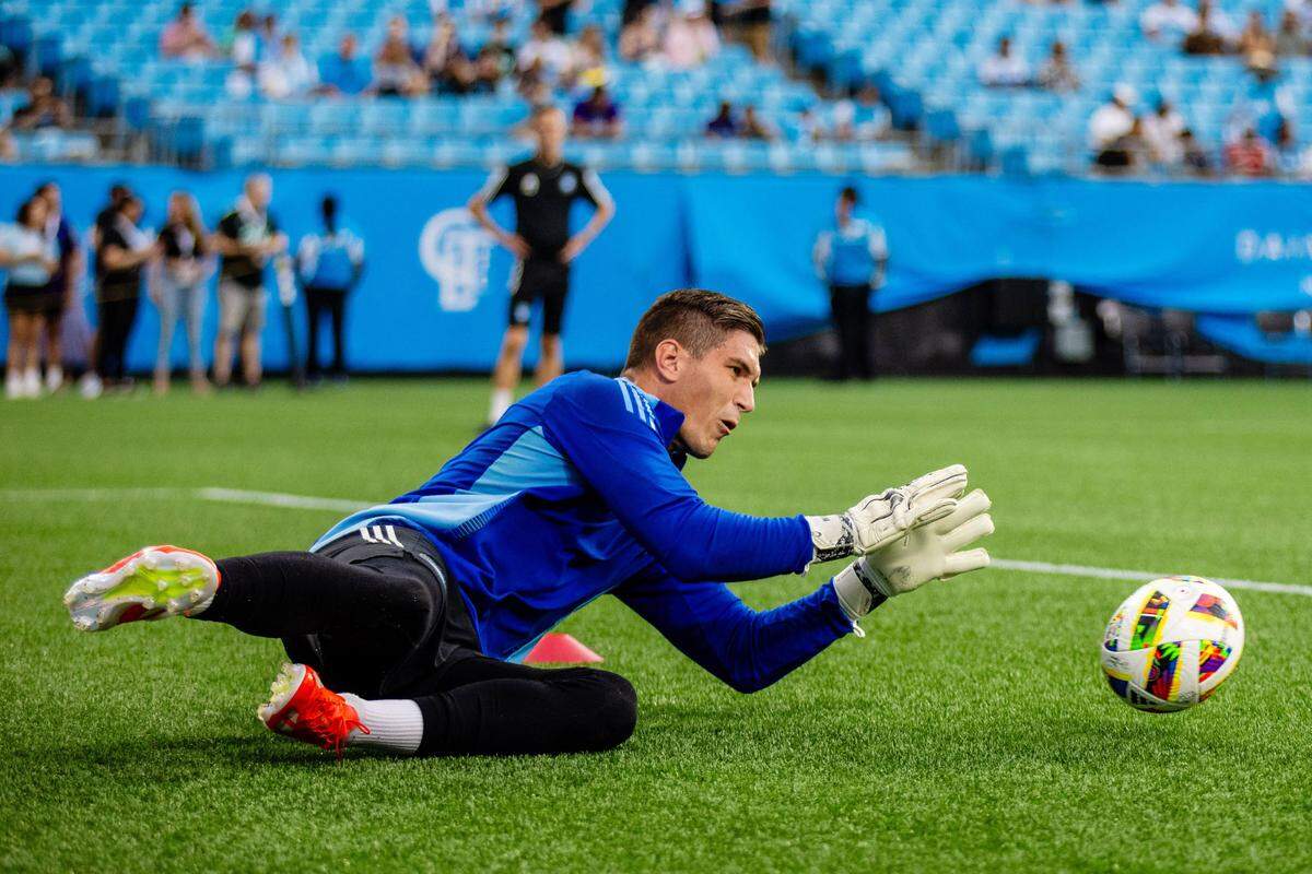 Charlotte FC goalkeeper Kristijan Kahlina (1) warms up before the game against the Philadelphia Union at Bank of America Stadium.