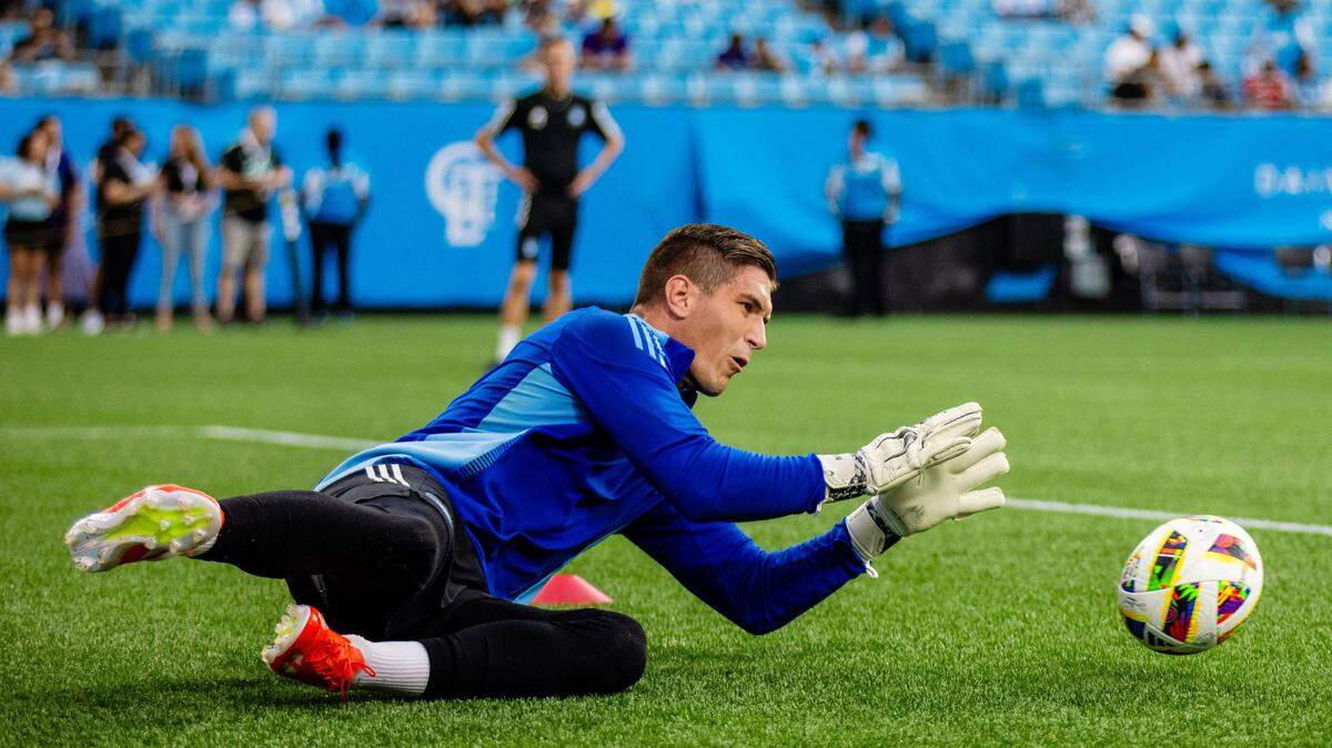 Charlotte FC goalkeeper Kristijan Kahlina (1) warms up before the game against the Philadelphia Union at Bank of America Stadium.