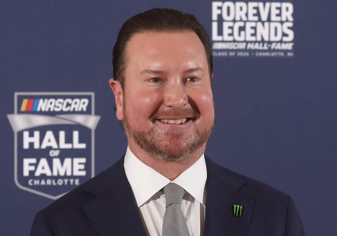 Former NASCAR driver Kurt Busch poses for photographs on the red carpet at the NASCAR Hall of Fame on Friday, January 23, 2026. Busch was enshrined in the Hall of Fame with Harry Gant and Ray Hendrick on Friday.