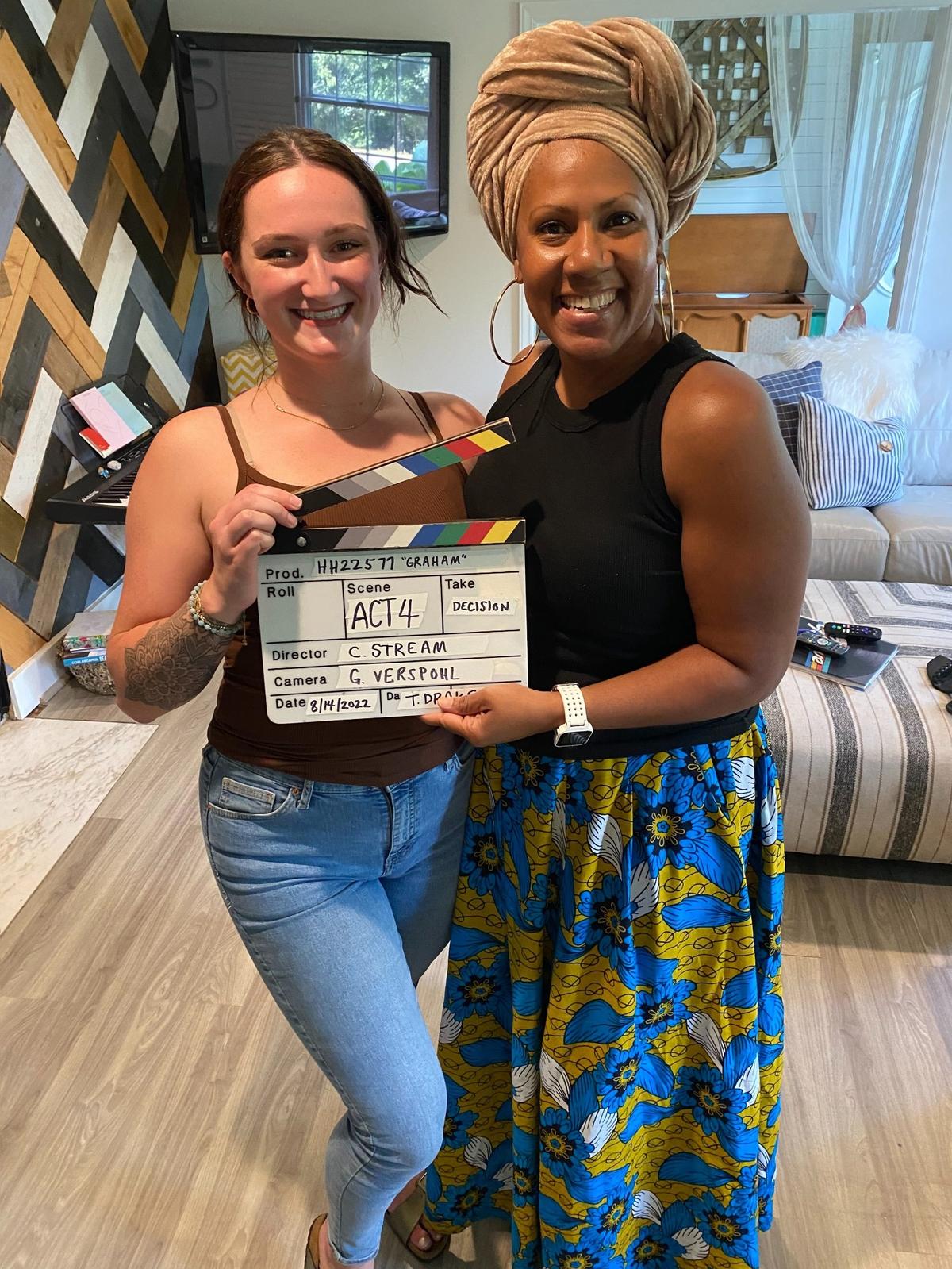 Natalie Graham with Cha Barefield pose during a break from shooting their episode of “House Hunters” in August.